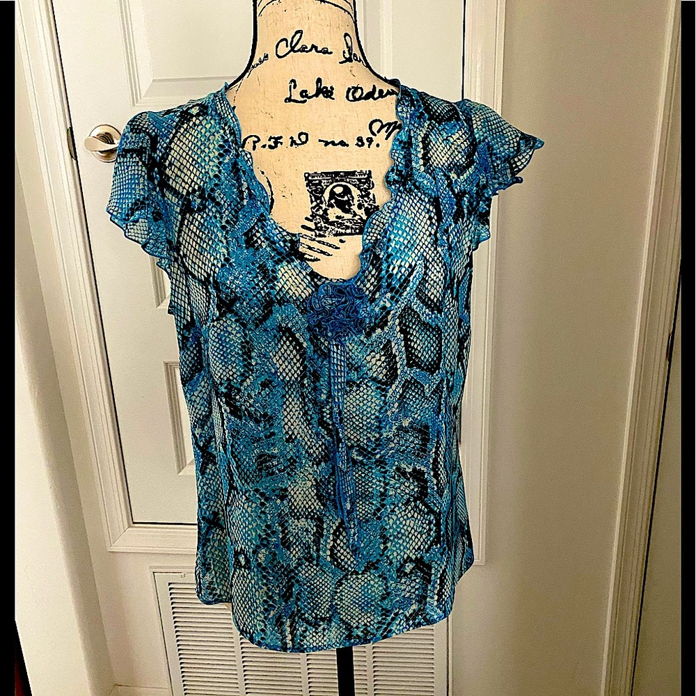 ESCADA VINTAGE BLOUSE. SIZE 10.  HAS GATHERED MATERIAL FLOWER IN FRONT.